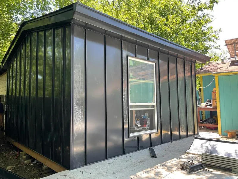 Black standing seam metal wall panels for Metal Roof Installation in Philipstown