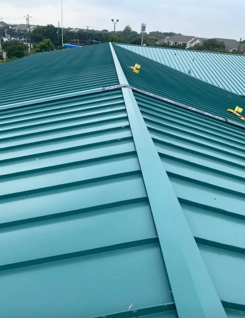 Green commercial metal roof ridge and valley for Metal Roof Repair in Philipstown