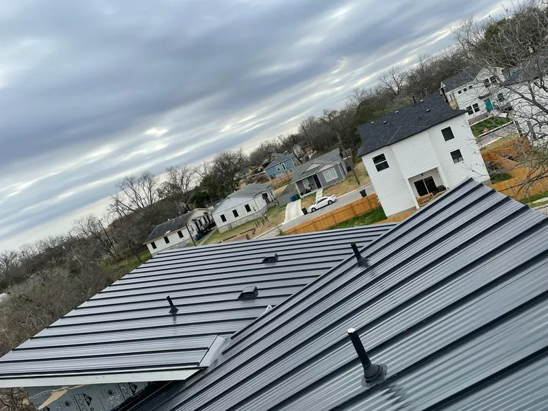 Standing seam metal roof panels with vents for Skylight Repair in Philipstown